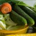 corn and green vegetable on yellow plastic container